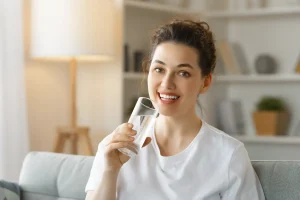 Woman drinking pure water, Water Treatment Columbia SC