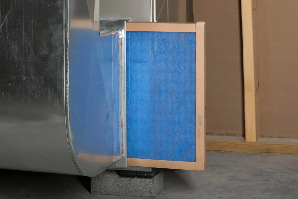 furnace filter replacement by hvac technician